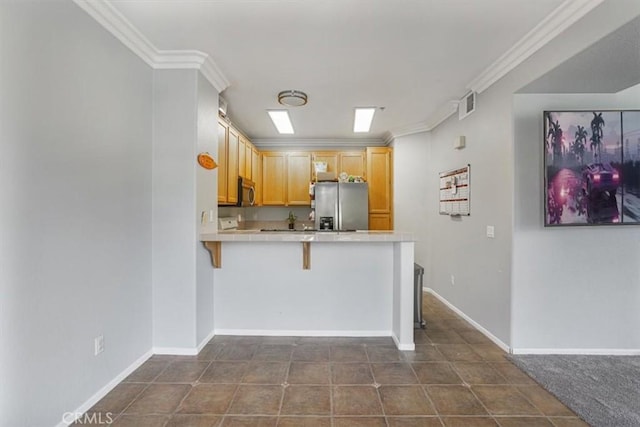 1441 Paseo Orion, San Diego, CA 92154 - kitchen with appliances with stainless steel finishes, a breakfast bar, tile counters, a peninsula, and visible vents