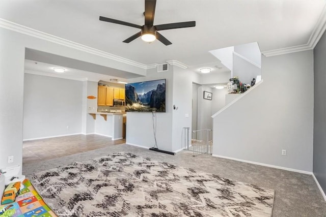 1441 Paseo Orion, San Diego, CA 92154 - unfurnished living room featuring ornamental molding, light carpet, a ceiling fan, and visible vents