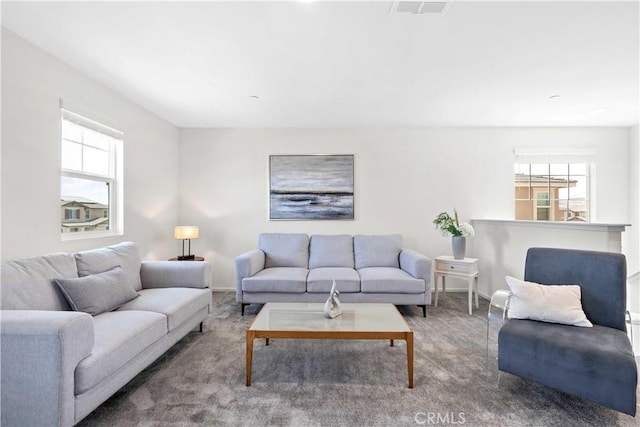 3308 Jack Rabbit Ct, Perris, CA 92570 - living room with baseboards, carpet flooring, and plenty of natural light