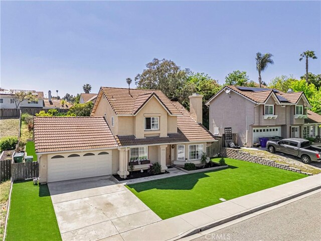 1426 Crestview Dr, Oceanside, CA 92056 - traditional home with stucco siding, driveway, a tile roof, an attached garage, and a residential view