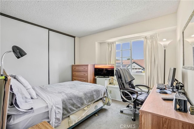 1426 Crestview Dr, Oceanside, CA 92056 - carpeted bedroom featuring a textured ceiling and an office area