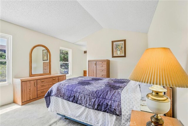 1426 Crestview Dr, Oceanside, CA 92056 - bedroom with light carpet, a textured ceiling, and vaulted ceiling