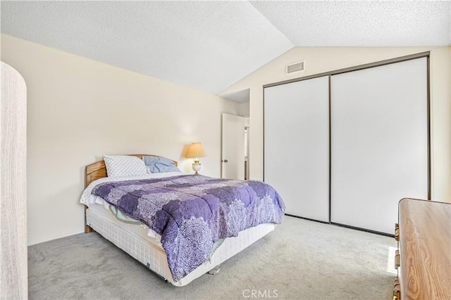 1426 Crestview Dr, Oceanside, CA 92056 - bedroom featuring carpet floors, lofted ceiling, a closet, and a textured ceiling