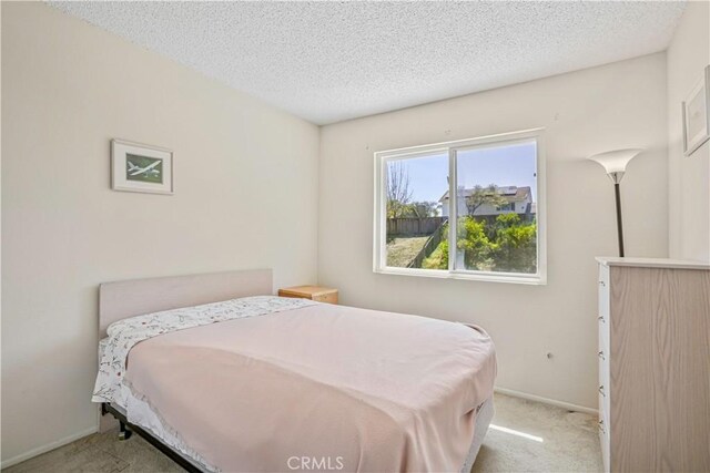 1426 Crestview Dr, Oceanside, CA 92056 - bedroom featuring carpet floors, baseboards, and a textured ceiling