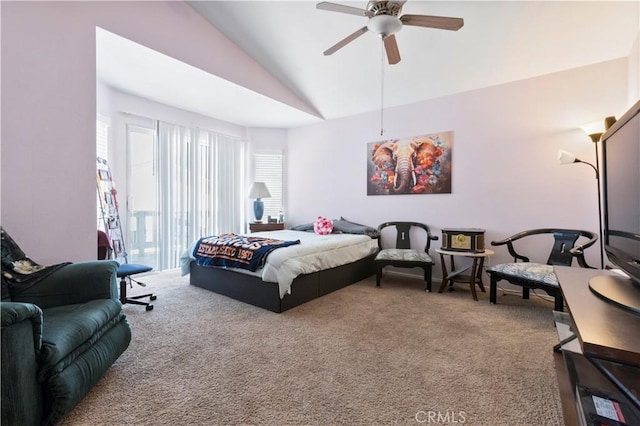 bedroom with lofted ceiling, carpet floors, and a ceiling fan