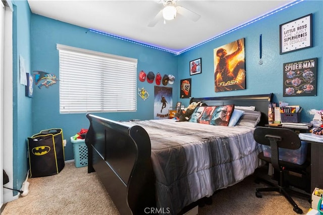 carpeted bedroom featuring ceiling fan