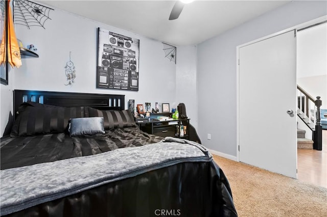 bedroom with carpet floors and ceiling fan