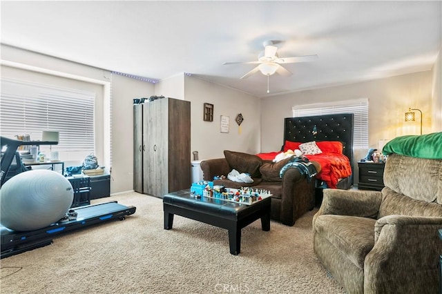living room featuring ceiling fan and carpet floors