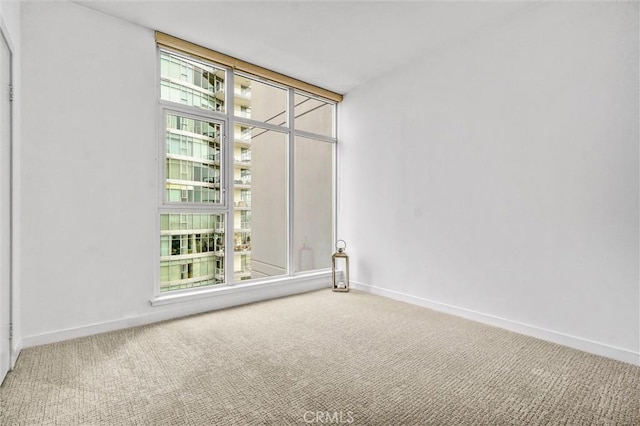 411 W Seaside Way Unit 1804, Long Beach, CA 90802 - empty room with carpet floors, baseboards, and healthy amount of natural light