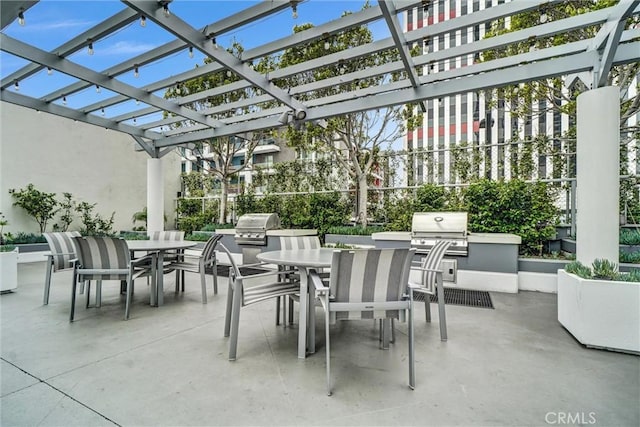 411 W Seaside Way Unit 1804, Long Beach, CA 90802 - view of patio featuring outdoor dining space and a pergola