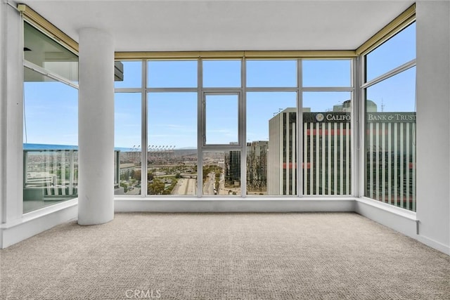 411 W Seaside Way Unit 1804, Long Beach, CA 90802 - unfurnished sunroom with plenty of natural light and carpet flooring