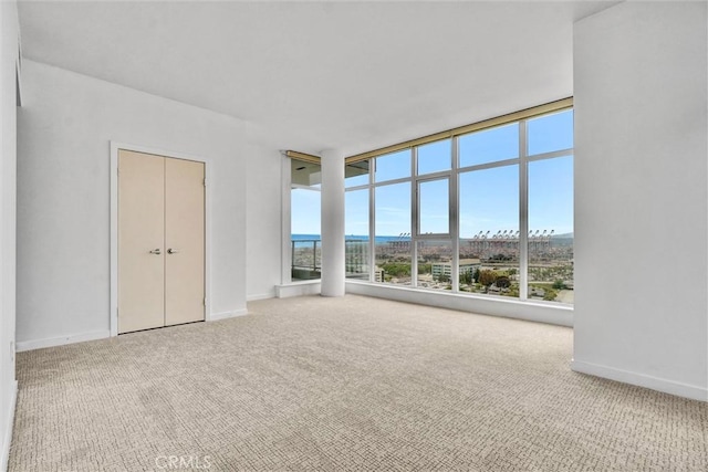 411 W Seaside Way Unit 1804, Long Beach, CA 90802 - unfurnished bedroom with carpet floors and baseboards