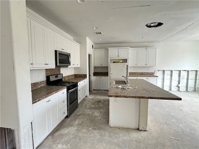 3175 E Yountville Dr, Ontario, CA 91761 - kitchen with visible vents, a sink, concrete floors, and stainless steel appliances