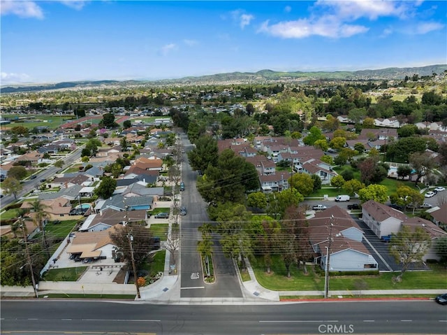 bird's eye view featuring a residential view and a mountain view