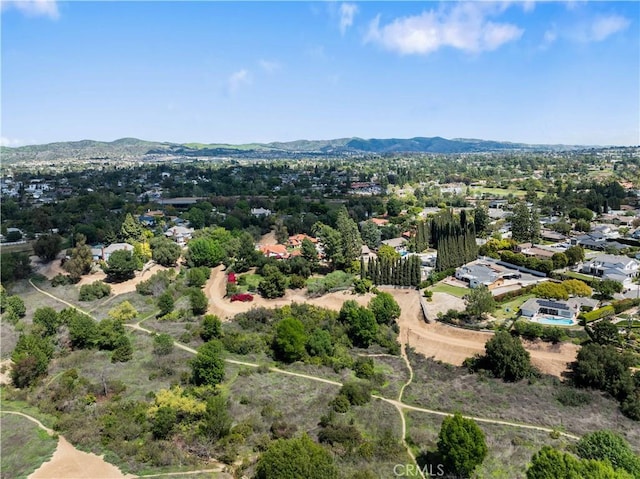 bird's eye view with a mountain view