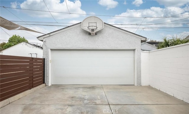 detached garage with fence