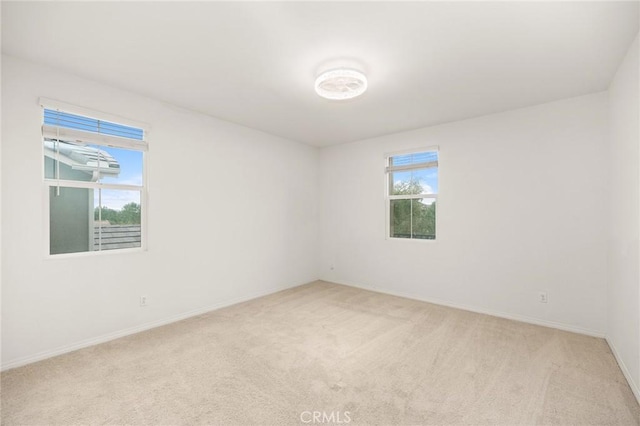 37544 River Oats Ln, Murrieta, CA 92563 - empty room featuring baseboards and light carpet