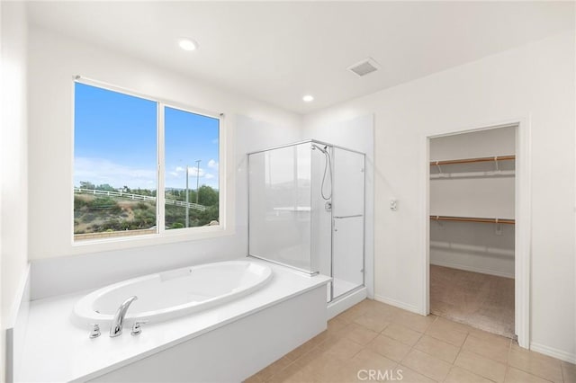 37544 River Oats Ln, Murrieta, CA 92563 - full bath with a shower stall, a spacious closet, tile patterned floors, and a garden tub