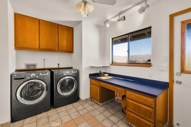 laundry room featuring cabinet space, light tile patterned flooring, ceiling fan, separate washer and dryer, and rail lighting