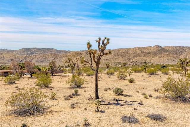 property view of mountains featuring a desert view and a rural view