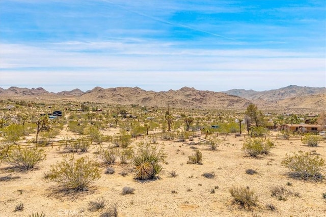 mountain view with a rural view and a desert view