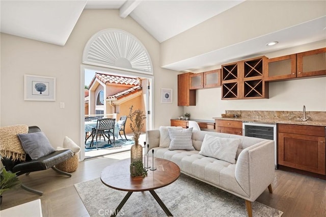 804 N Juanita Ave Unit B, Redondo Beach, CA 90277 - living area with indoor bar, light wood-style floors, beamed ceiling, and wine cooler