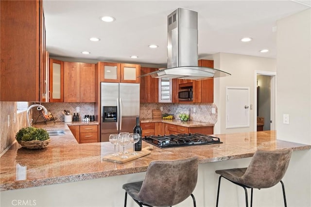 804 N Juanita Ave Unit B, Redondo Beach, CA 90277 - kitchen featuring stainless steel appliances, a sink, brown cabinetry, and island range hood
