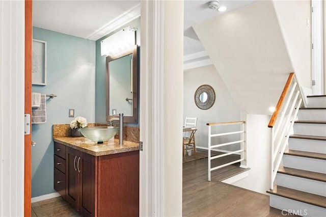 804 N Juanita Ave Unit B, Redondo Beach, CA 90277 - bathroom featuring baseboards, wood finished floors, and vanity