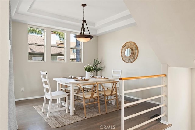804 N Juanita Ave Unit B, Redondo Beach, CA 90277 - dining area with a tray ceiling, wood finished floors, and baseboards