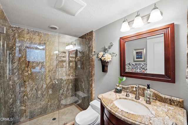 full bathroom with a textured ceiling, a shower stall, visible vents, toilet, and vanity