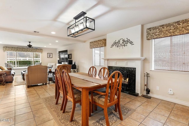 1894 Rambling Rd, Simi Valley, CA 93065 - dining space with light tile patterned floors, a high end fireplace, plenty of natural light, and recessed lighting