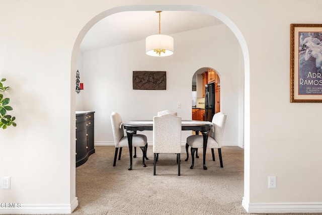 1894 Rambling Rd, Simi Valley, CA 93065 - carpeted dining area featuring arched walkways and baseboards
