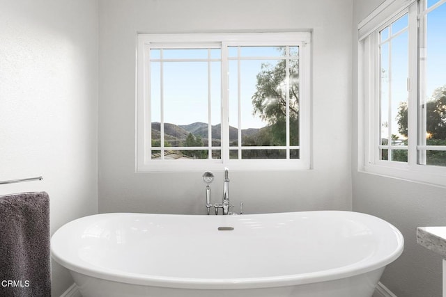 1894 Rambling Rd, Simi Valley, CA 93065 - full bath with a freestanding bath, healthy amount of natural light, and a mountain view