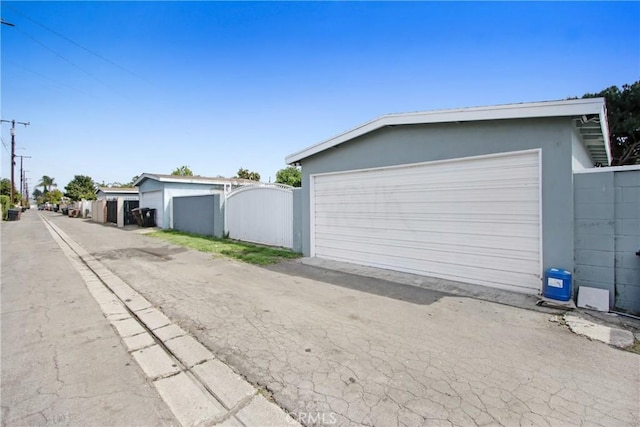 detached garage with fence