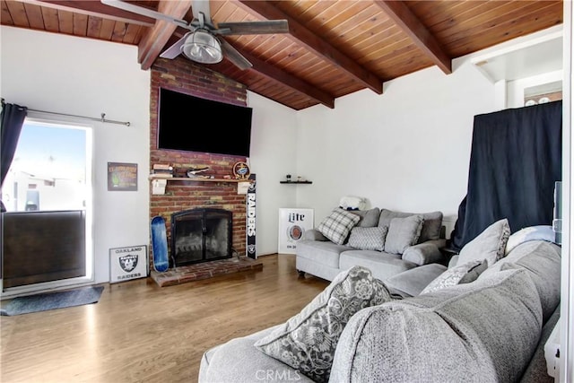 living room with wood ceiling, ceiling fan, wood finished floors, and vaulted ceiling with beams