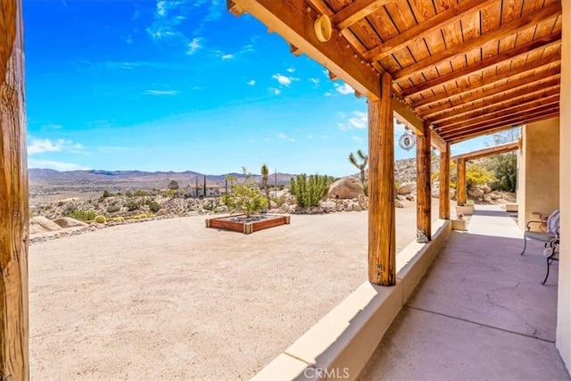57710 Bandera Rd, Yucca Valley, CA 92284 - view of patio featuring a mountain view