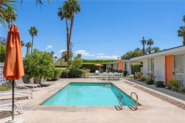 pool with a patio area