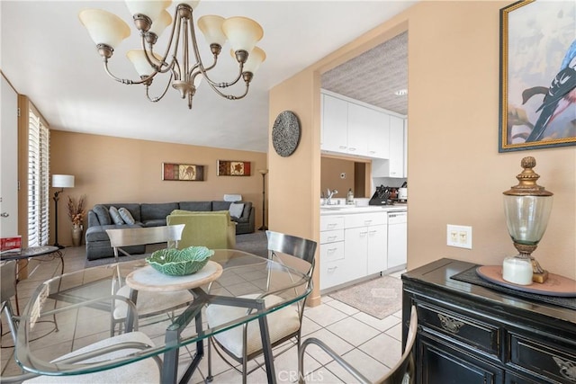 dining space featuring a chandelier and light tile patterned floors