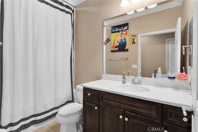 full bathroom featuring curtained shower, toilet, vanity, and tile patterned floors