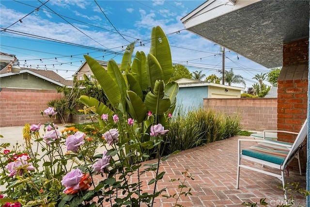 view of patio / terrace with fence