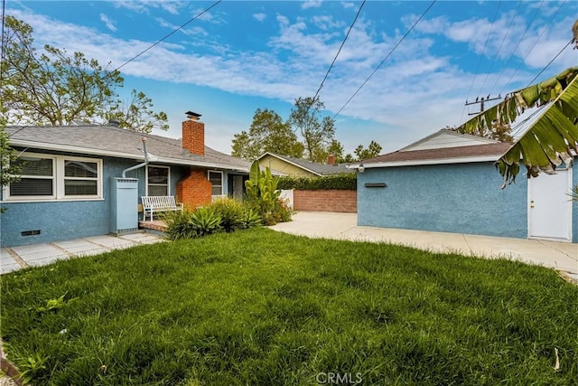 view of yard featuring fence and a patio area