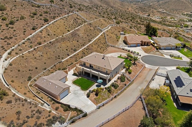 aerial view with a desert view and a rural view