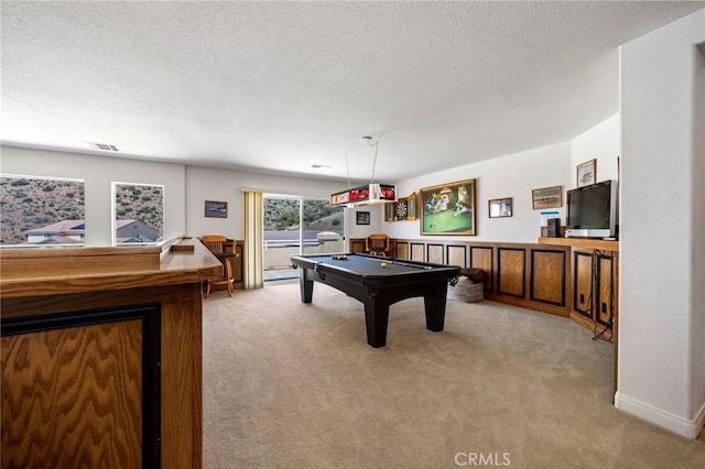 rec room featuring visible vents, carpet flooring, a textured ceiling, and pool table