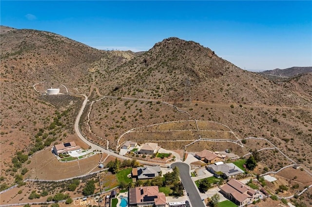 drone / aerial view with a desert view and a mountain view
