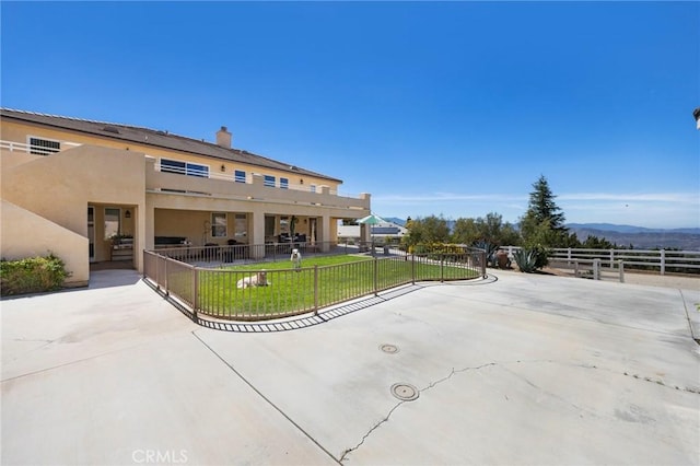 view of patio / terrace with fence