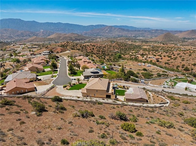 drone / aerial view with a residential view and a mountain view