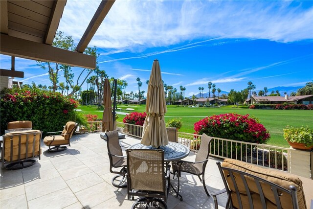 283 Wild Horse Dr, Palm Desert, CA 92211 - view of patio / terrace featuring outdoor dining space and golf course view