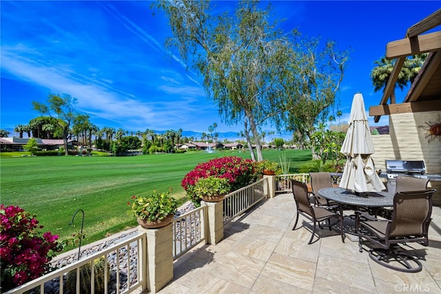 283 Wild Horse Dr, Palm Desert, CA 92211 - view of patio / terrace with outdoor dining area, area for grilling, and golf course view