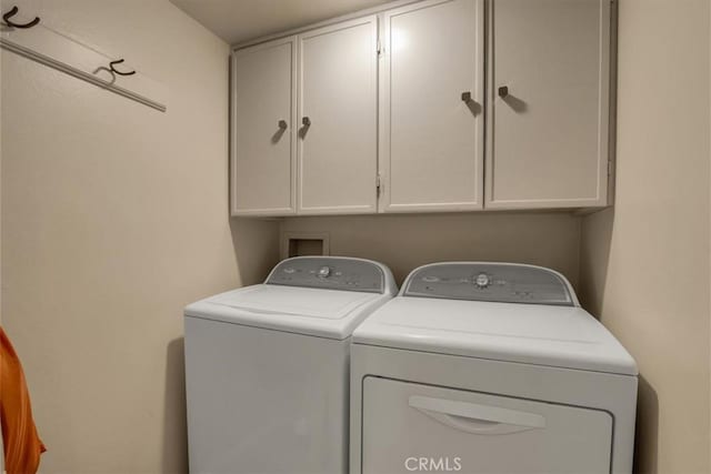 283 Wild Horse Dr, Palm Desert, CA 92211 - washroom with washing machine and dryer and cabinet space