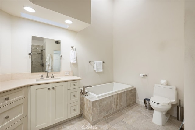 283 Wild Horse Dr, Palm Desert, CA 92211 - full bathroom with toilet, visible vents, a shower stall, a garden tub, and vanity